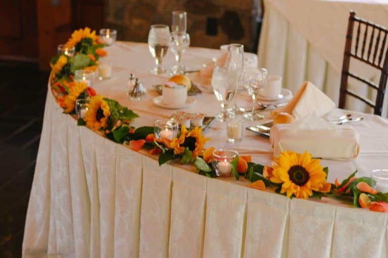 Wedding Couples' Table decorated with flowers
