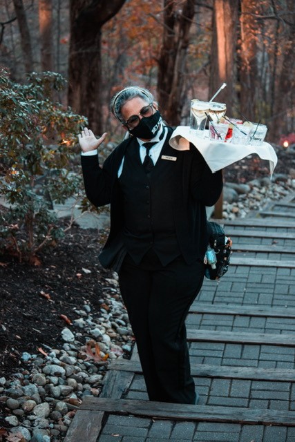 Server brings drinks to Woodsgate ceremony site