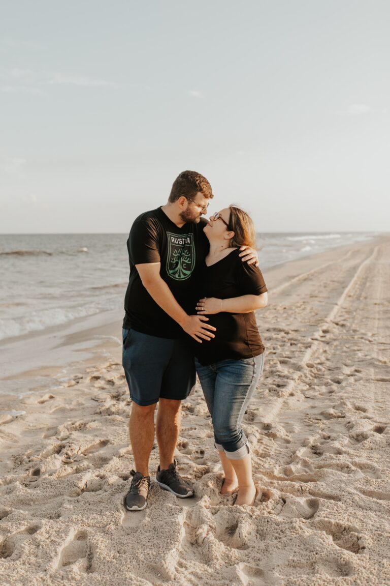 Couple embraces at the Jersey shore