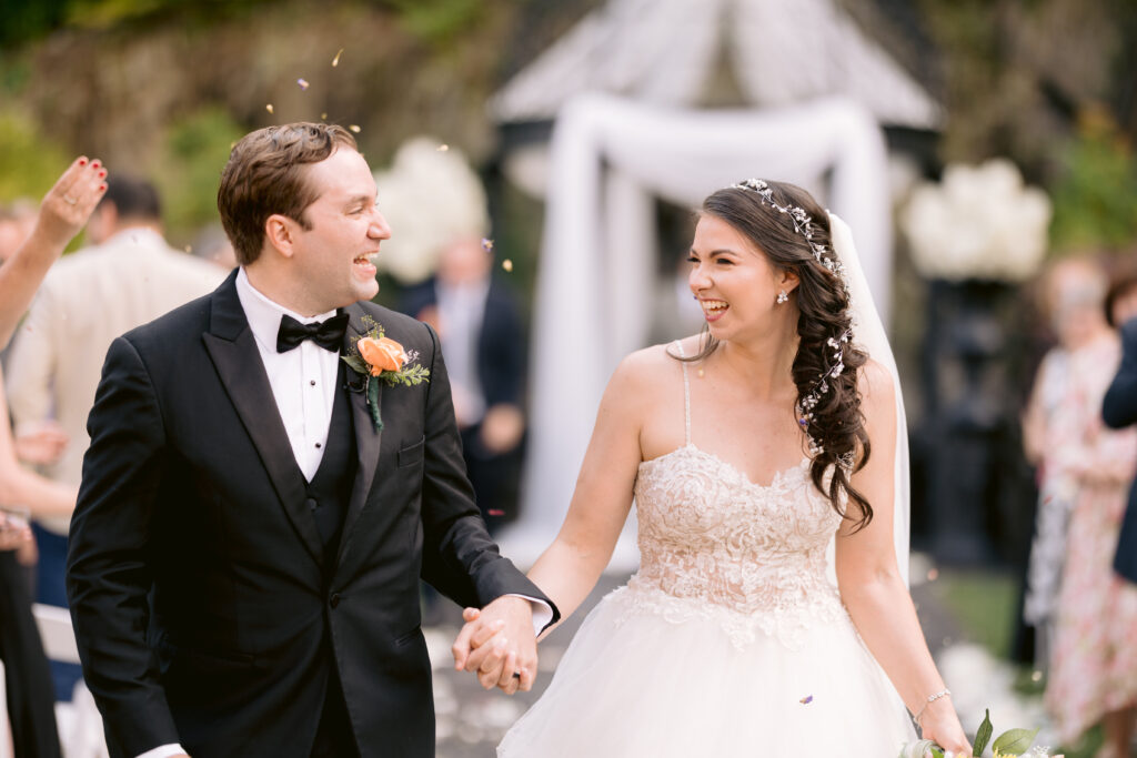 Bride and groom recess up Terraview's aisle