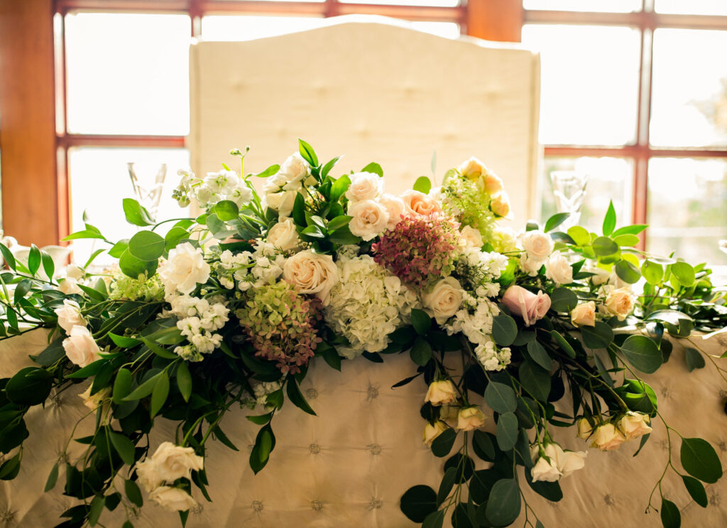 Floral garland adorns Stroudsmoor sweetheart table