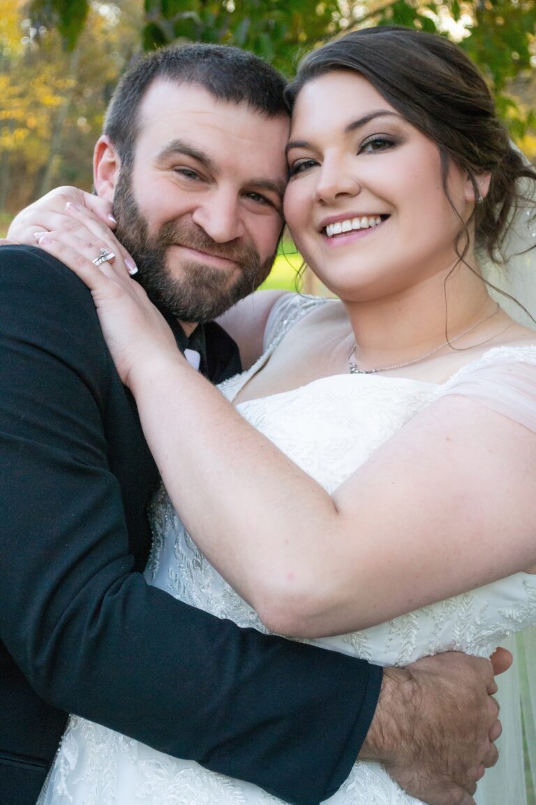 Bride and groom embrace